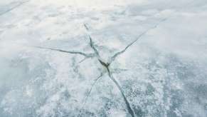 Close up of cracked winter ice.