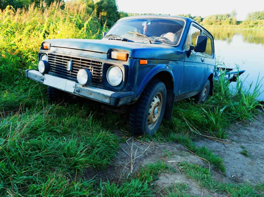 Light blue two-door Lada Niva SUV