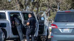Police officers search a truck with probable cause.