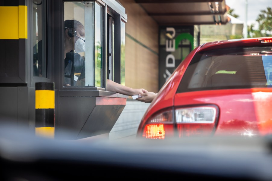 Cars waiting in line at a McDonald's drive-through