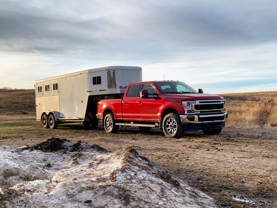 A ford super Duty truck pulling a trailer