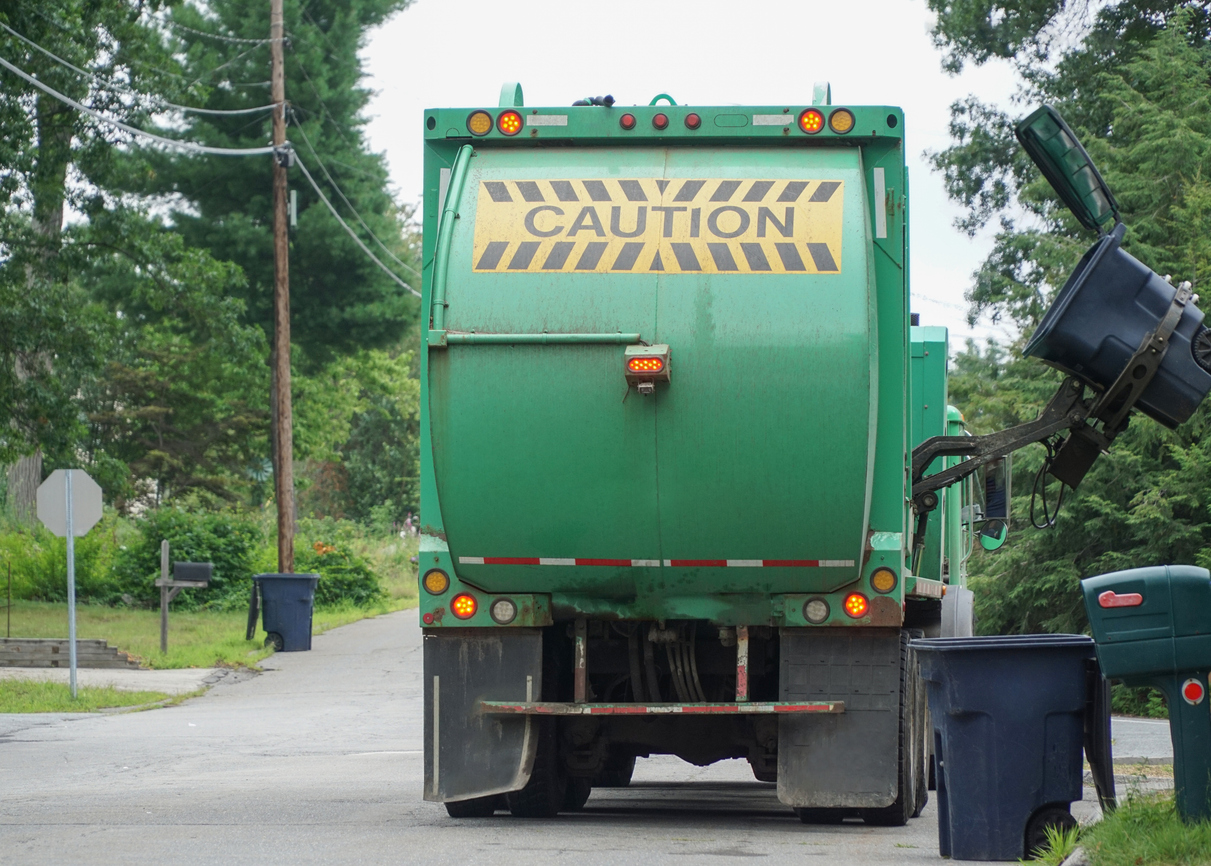 The back of a garbage truck 
