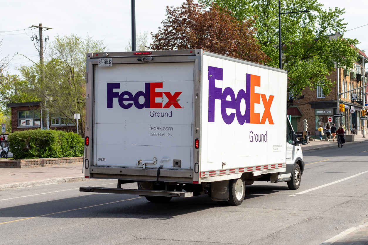 A FedEx truck in the city 