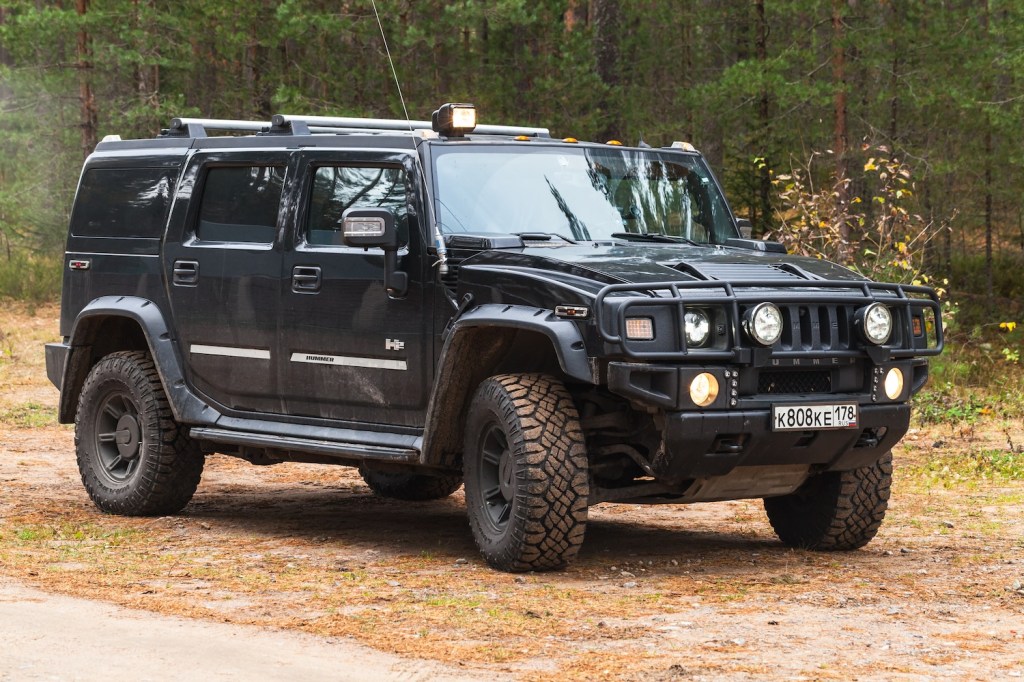 A 2006 Hummer H2 parked in the dirt