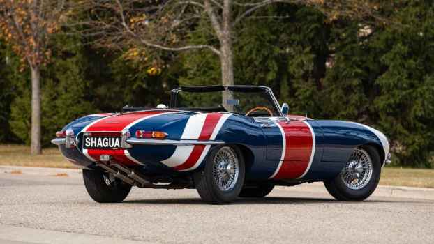 The rear passenger's quarter panel of the 1967 Jaguar E-Type Series 1 driving by Michael Meyers in the movie Austin Powers