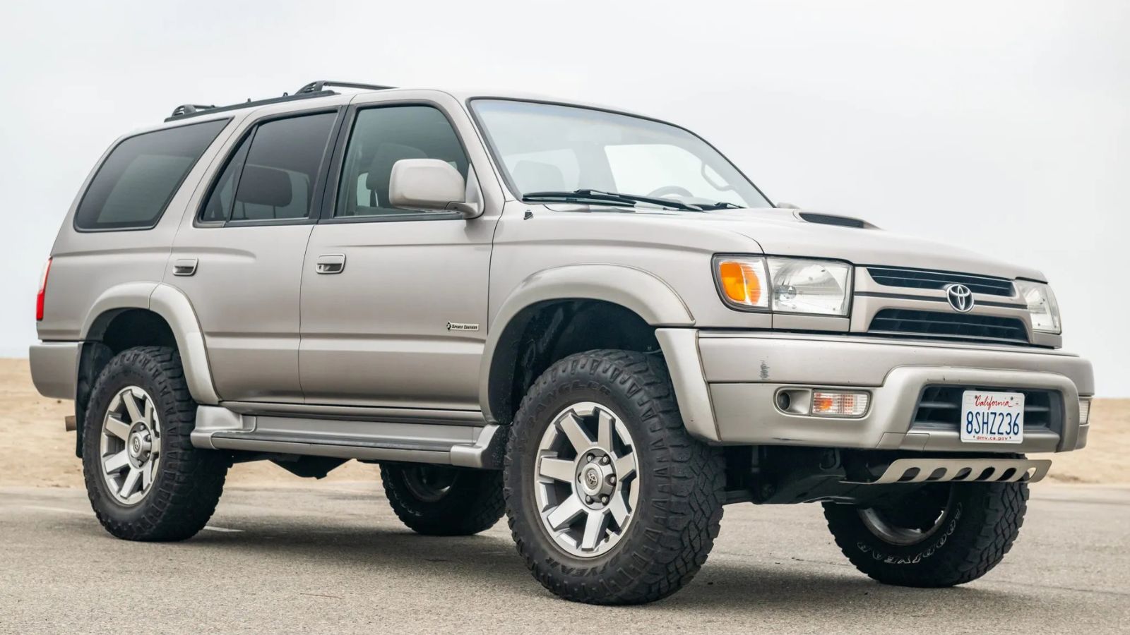 A silver 2002 Toyota 4Runner parked in right front angle view