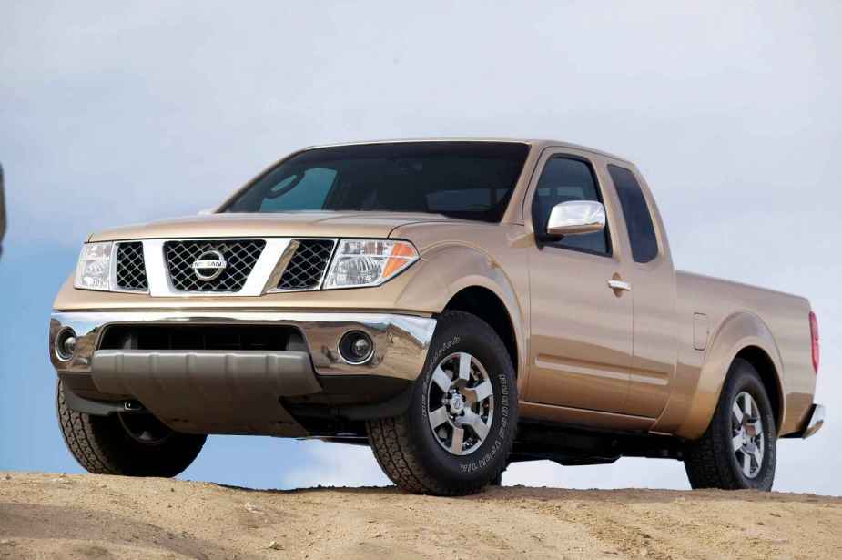 A gold 2005 Nissan Frontier pickup truck