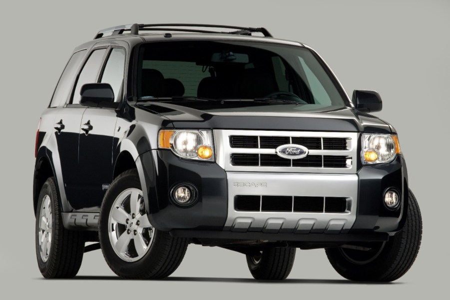 A black 2008 Ford Escape parked in close right front angle view