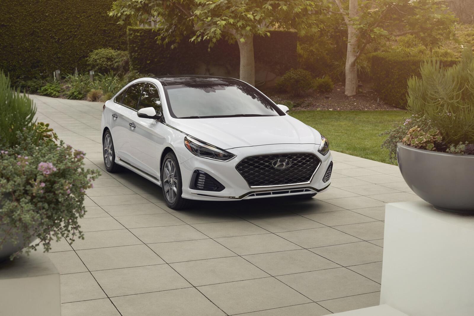 A white 2019 Hyundai Sonata parked in right front angle view