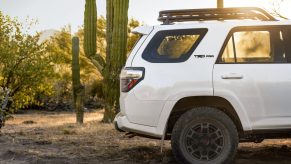 A white 2021 Toyota 4Runner right rear quarter profile view only