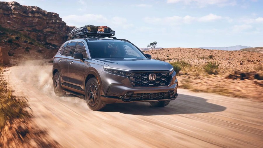 The 2024 Honda CR-V Hybrid on a dirt road