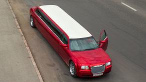 Overhead view of a red Chrysler limousine with a white roof.