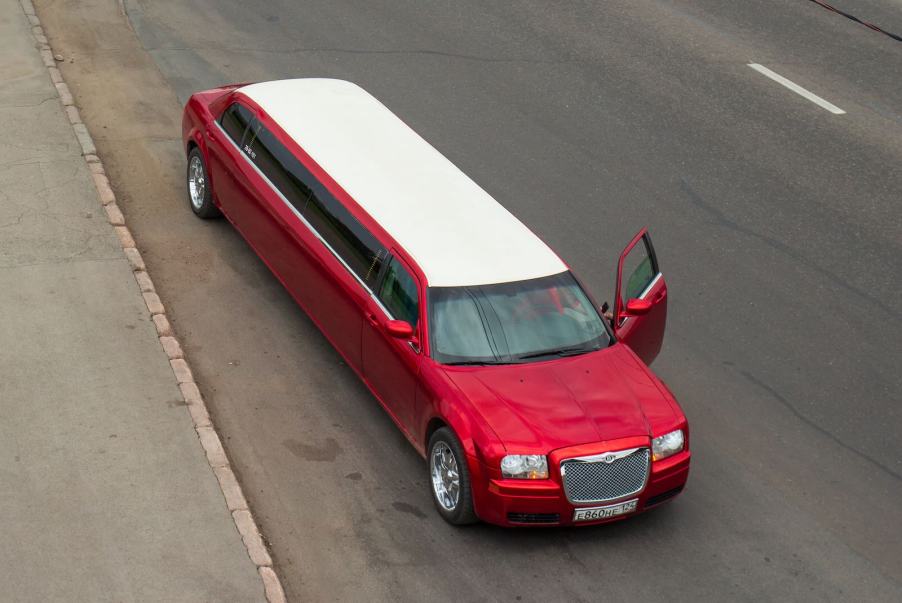 Overhead view of a red Chrysler limousine with a white roof.