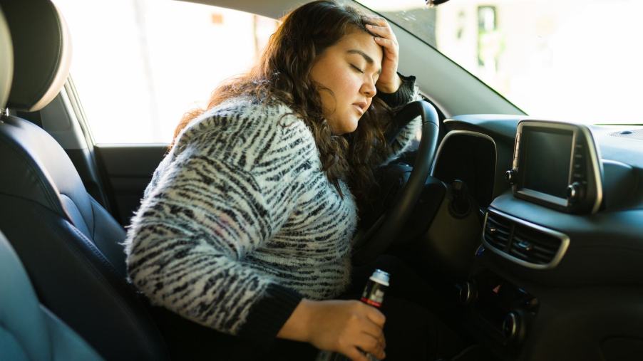 A woman decided to drive under the influence with a child in the car to go to a strip club. Now she's facing her second DUI.