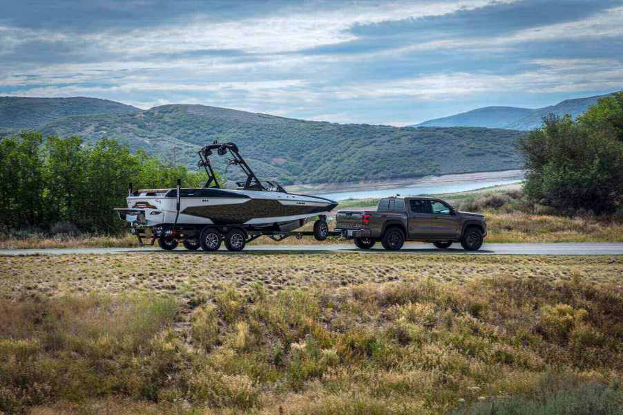 A Nissan Frontier, the deadliest pickup truck in America, towing a boat