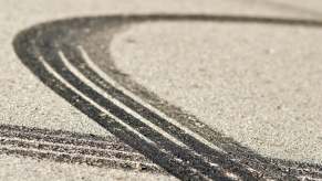 Mark where a car skidded into a guard rail on an icy highway