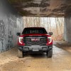 The 2025 GMC Sierra 1500 AT4X AEV Edition off-roading