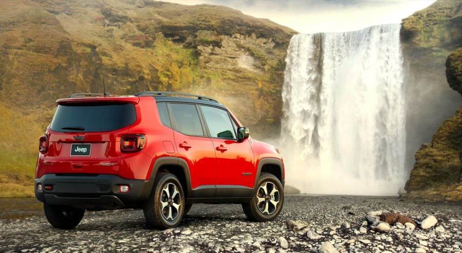 A 2021 Jeep Renegade, one of the vehicles on a current recall, by a waterfall.