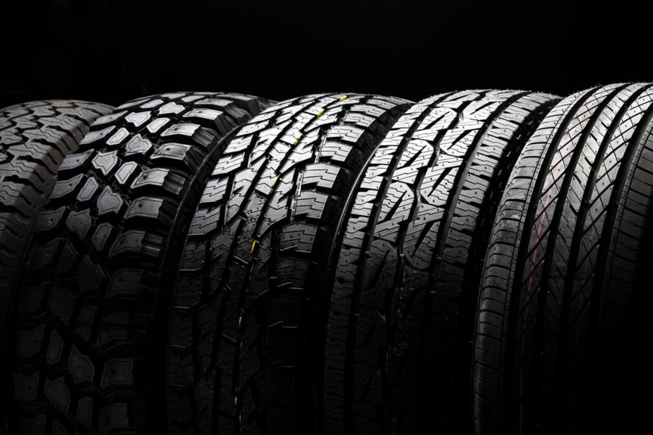 A set of new tires with tiny hairs or 'vent spews'.