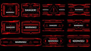 Red HUD warnings and danger symbols on a black screen.