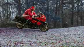 A Santa Claus on a sport bike, like the Florida man who ran from the cops dressed as Santa.