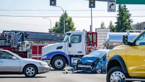 A deadly crash between a truck and a small car.