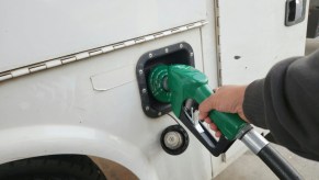 Driver fueling up a fleet vehicle.