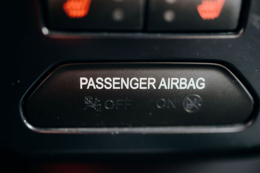 A passenger airbag sign not being illuminated on the dashboard of a car
