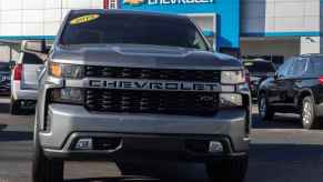 A Chevy Silverado truck parked in a dealership lot