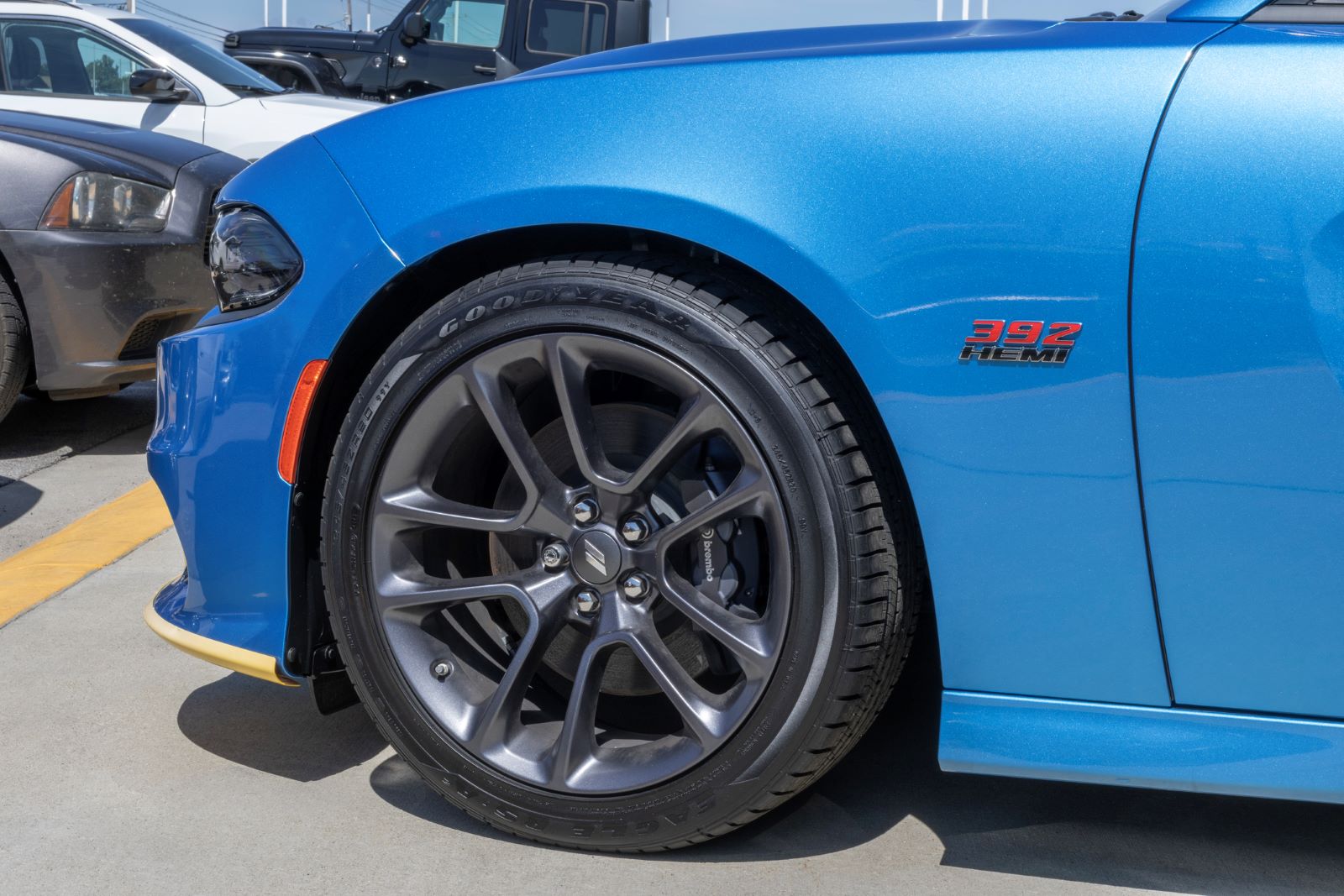 The front of a Dodge Charger SRT Hellcat with a Hemi V8 engine