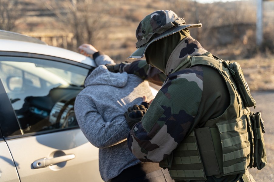 A border control officer making an arrest