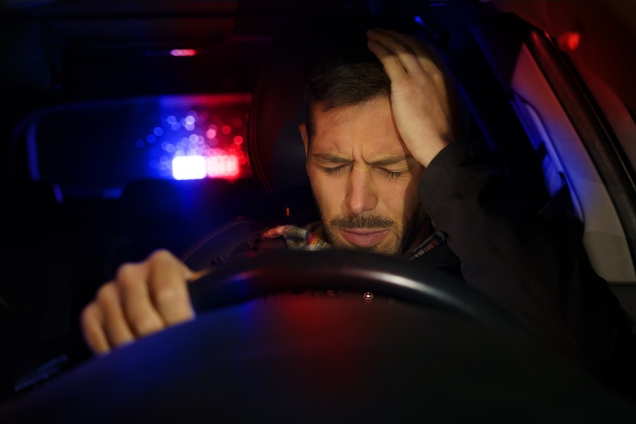 A man being pulled over by the police