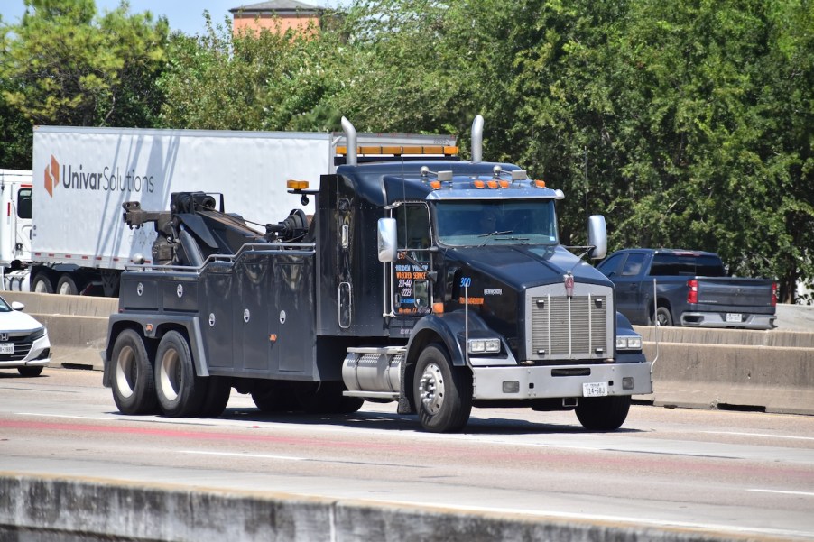 A tow truck on the highway