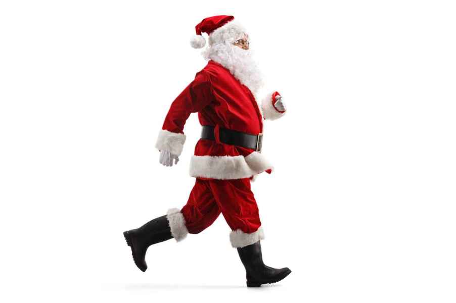 Man in Santa Claus costume running facing right frame