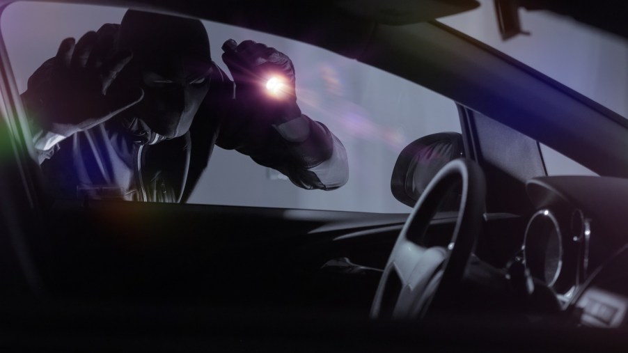 More than a dozen people attending a Christmas Eve mass became victims of some form of car theft while in the service.