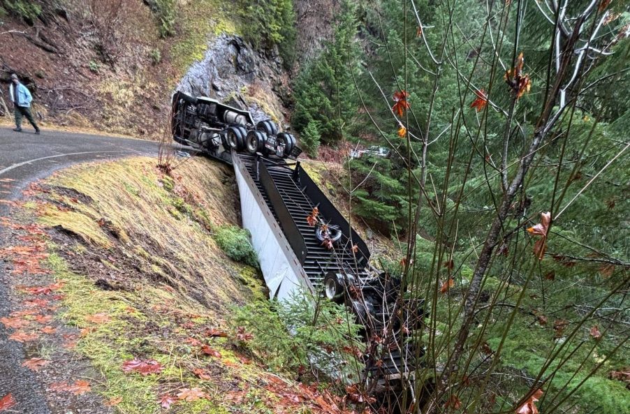 Overturned semi-truck carrying pesticides on a remote National Forest road