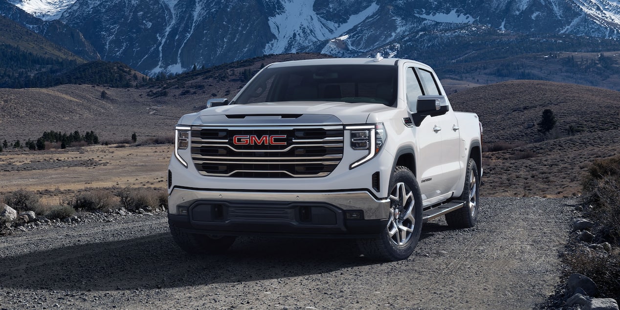 The 2024 GMC Sierra on a gravel road