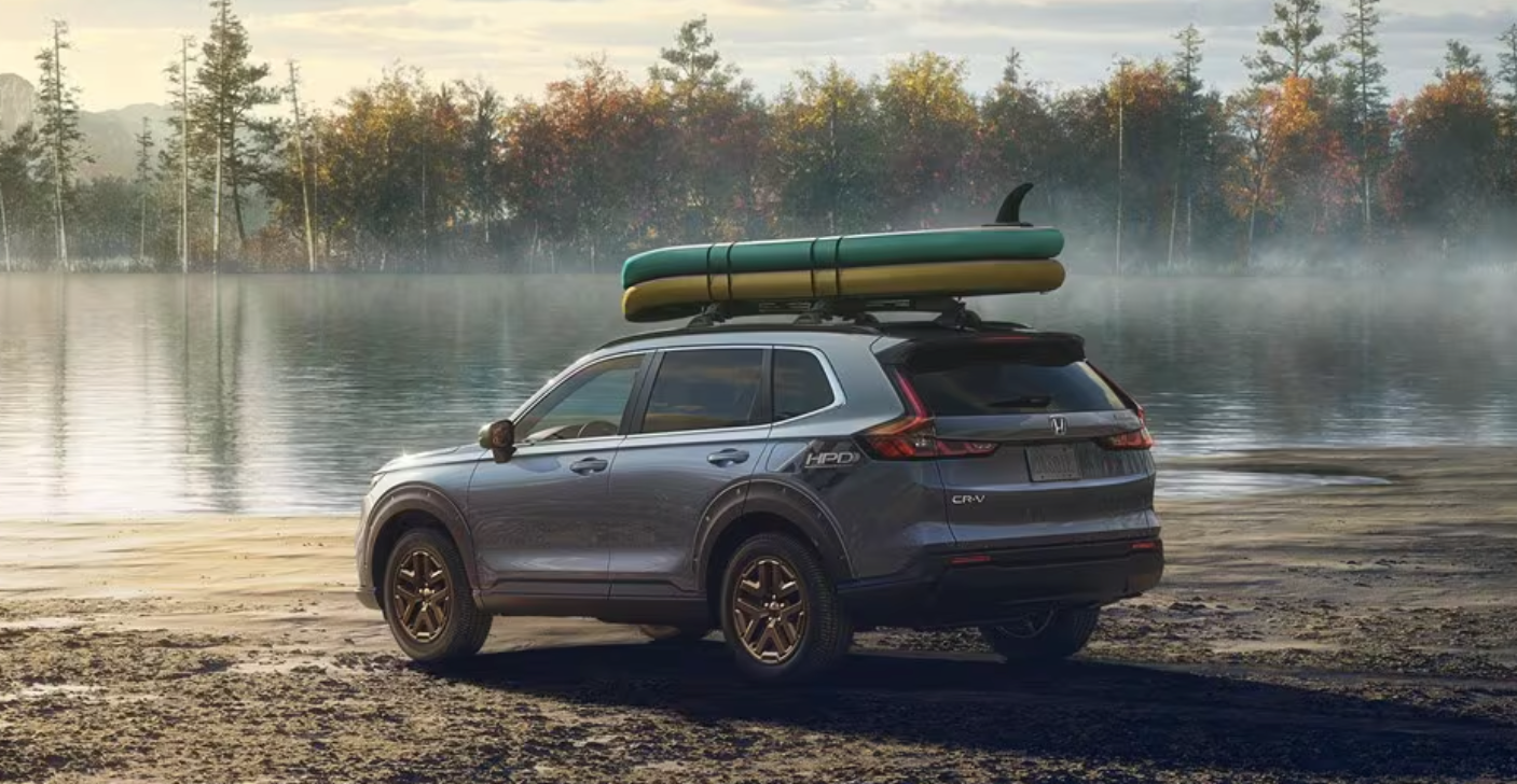 The 2024 Honda CR-V parked near a lake 