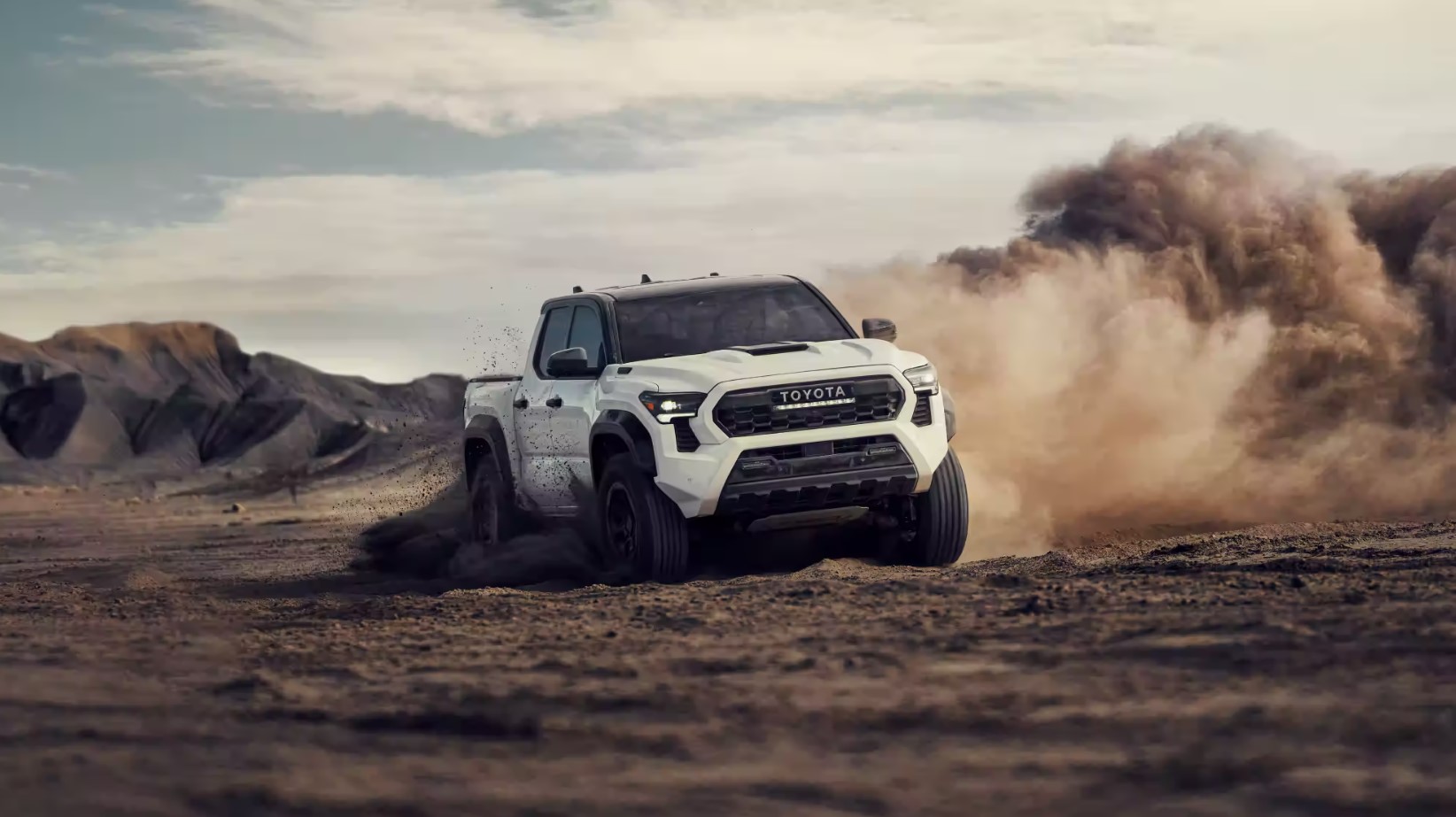 The 2024 Toyota Tacoma kicking up dirt