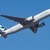 A Cathay Pacific flight takes off to fly to LAX.
