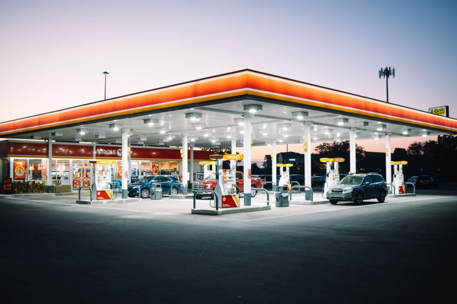 A lit gas station at night is a common source of car theft, despite the lights.