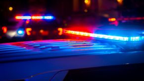 Police cars with their cherry lights flashing during a traffic stop