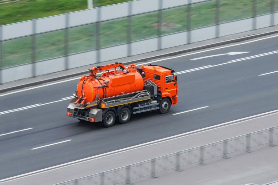 A Sewage truck on the road