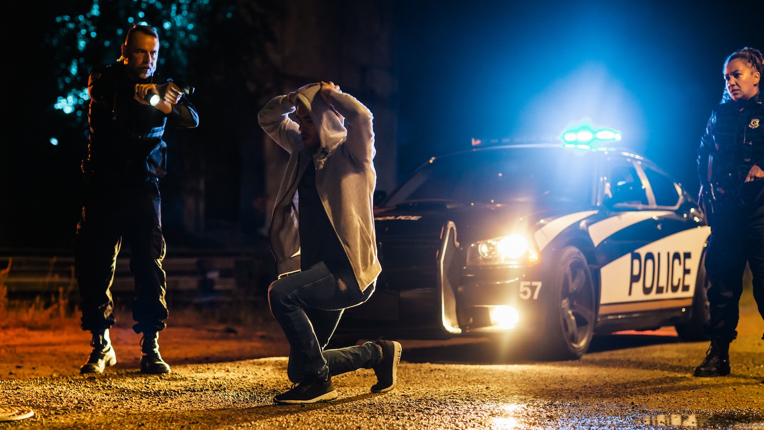 Police officers arresting a suspect 