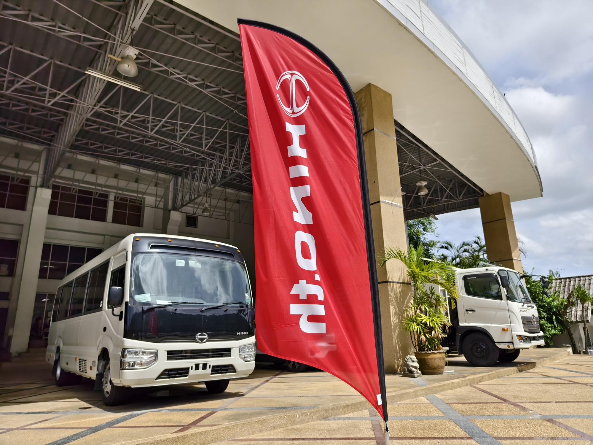 A Hino bus in a show room