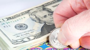 A person playing a lottery ticket