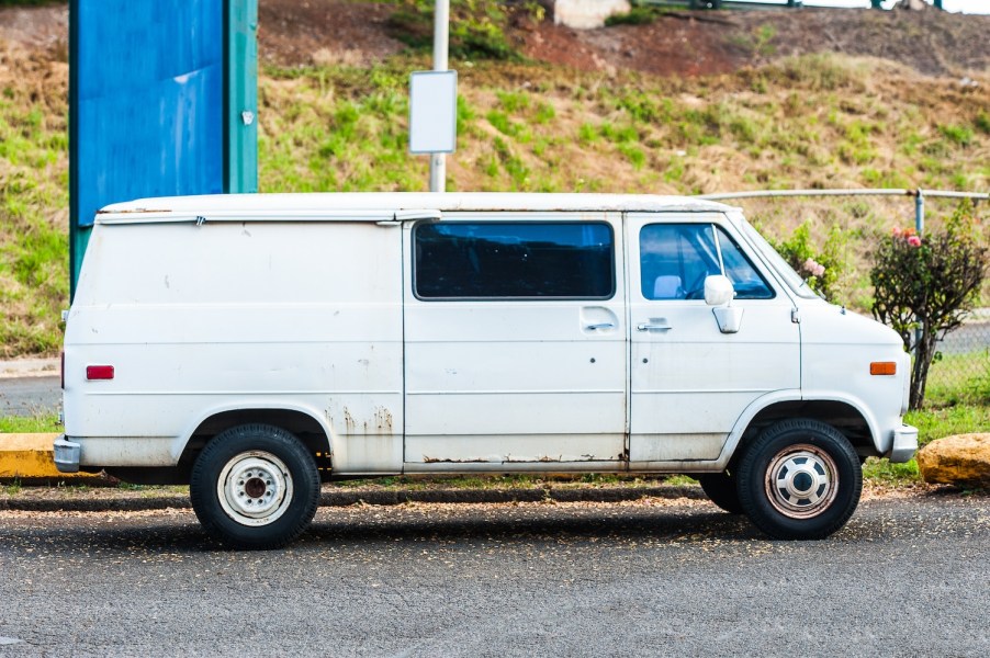 A white van parked in the city