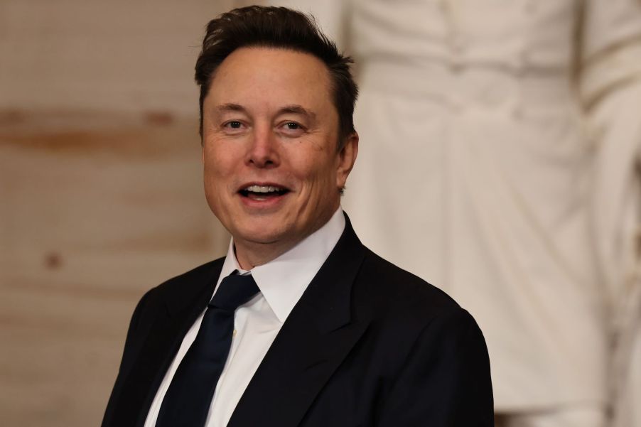 Elon Musk smiling in the direction of a zoomed-in camera