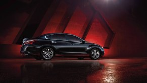 A 2016 Nissan Altima parked in a dark zone in far right side angle view