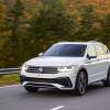 A white 2022 Volkswagen Tiguan SUV driving